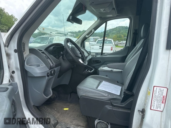 2018 Ford Transit with VIN 1FTYE1CM1JKB31128, listed as a IAAI auction lot 42737735 with 208,336 mi miles and . Bid and sale history available at DreamBid. Image 2.