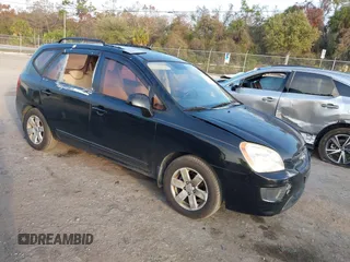 2009 Kia Rondo LX with VIN KNAFG528897221398, listed as a IAAI auction lot 41514121 with 121,183 mi miles. Bid and sale history available at carsss.com. Image 1.