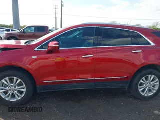 2021 Cadillac XT5 FWD Luxury with VIN 1GYKNAR45MZ125383, listed as a IAAI auction lot 41685947 with 64,997 mi miles. Bid and sale history available at carsss.com. Image 15.