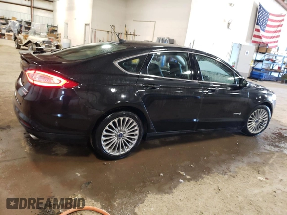 2014 Ford Fusion Titanium Hybrid z VIN 3FA6P0RUXER168706, wystawiony jako Copart lot #55362295 z przebiegiem 136 382 mil mil oraz Czysty tytuł • Clean title. Historia ofert i sprzedaży dostępna na DreamBid. Obrazek 3.