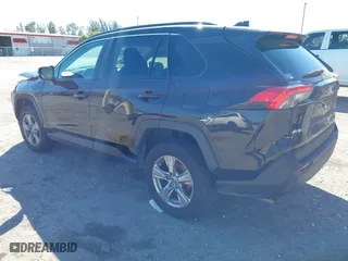 2022 Toyota RAV4 XLE with VIN 2T3W1RFV5NC180241, listed as a IAAI auction lot 41774074 with 63,902 mi miles. Bid and sale history available at carsss.com. Image 3.