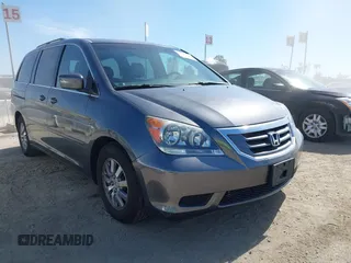 2010 Honda Odyssey EX-L z VIN 5FNRL3H73AB060164, wystawiony jako IAAI lot #42647629 z przebiegiem 76 349 mil mil oraz . Historia ofert i sprzedaży dostępna na DreamBid. Obrazek 1.