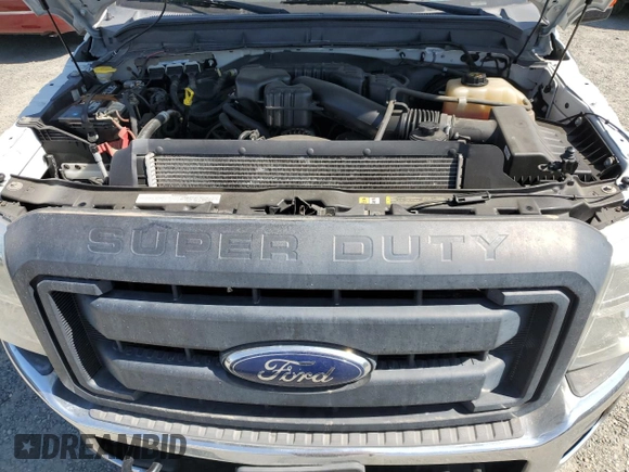 2014 Ford F-250 XL z VIN 1FTBF2A63EEA73881, wystawiony jako Copart lot #57694895 z przebiegiem 228 589 mil mil oraz Czysty tytuł • Clean title. Historia ofert i sprzedaży dostępna na DreamBid. Obrazek 11.