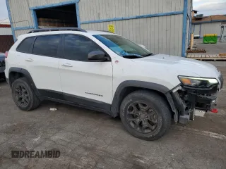 2019 Jeep Cherokee Trailhawk Elite with VIN 1C4PJMBX7KD360617, listed as a Copart auction lot 45765245 with 58,229 mi miles and Salvage Title. Bid and sale history available at carsss.com. Image 4.
