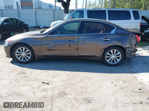 2015 Infiniti Q50 Premium z VIN JN1BV7AR3FM396882, wystawiony jako IAAI lot #37523335 z przebiegiem 89 761 mil mil oraz . Historia ofert i sprzedaży dostępna na DreamBid. Obrazek 13.