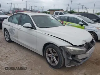 2014 BMW 3 Series 320i xDrive with VIN WBA3C3C52EP661389, listed as a IAAI auction lot 42160042 with 131,997 mi miles and . Bid and sale history available at DreamBid. Image 1.