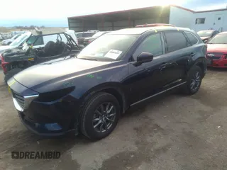 2021 Mazda CX-9 Sport with VIN JM3TCBBY4M0519407, listed as a IAAI auction lot 40883497 with 90,205 mi miles and . Bid and sale history available at carsss.com. Image 2.