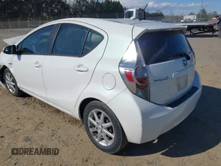 2012 Toyota Prius c One with VIN JTDKDTB33C1511612, listed as a IAAI auction lot 42027076 with 134,618 mi miles. Bid and sale history available at carsss.com. Image 3.