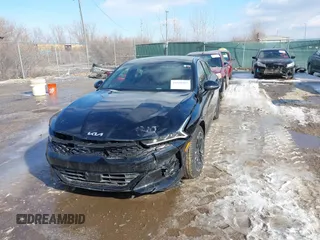 2024 Kia K5 GT-Line z VIN 5XXG64J28RG255382, wystawiony jako IAAI lot #41516382 z przebiegiem 12 330 mil mil oraz . Historia ofert i sprzedaży dostępna na DreamBid. Obrazek 12.