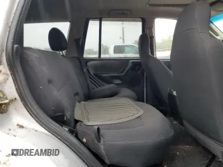2004 Jeep Grand Cherokee Laredo z VIN 1J4GW48S74C288625, wystawiony jako Copart lot #61290805 z przebiegiem 194 615 mil mil oraz Czysty tytuł • Clean title. Historia ofert i sprzedaży dostępna na DreamBid. Obrazek 11.