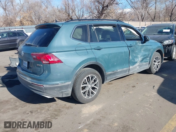 2021 Volkswagen Tiguan SE with VIN 3VV2B7AXXMM089913, listed as a IAAI auction lot 41402158 with 68,158 mi miles and . Bid and sale history available at DreamBid. Image 4.