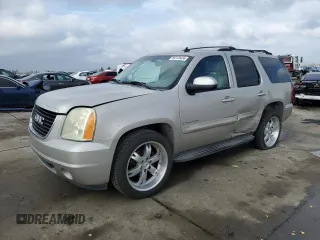 2007 GMC Yukon SLT with VIN 1GKFK130X7R106388, listed as a Copart auction lot 86125434 with 144,528 mi miles and Salvage Title. Bid and sale history available at carsss.com. Image 1.