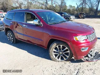 2017 Jeep Grand Cherokee Overland with VIN 1C4RJECG7HC823478, listed as a IAAI auction lot 41367186 with 82,873 mi miles. Bid and sale history available at carsss.com. Image 1.