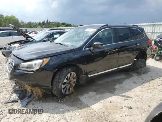 2017 Subaru Outback Touring z VIN 4S4BSATC5H3325442, wystawiony jako Copart lot #59724154 z przebiegiem 144 617 mil mil oraz Szkoda całkowita • Salvage title. Historia ofert i sprzedaży dostępna na DreamBid. Obrazek 1.