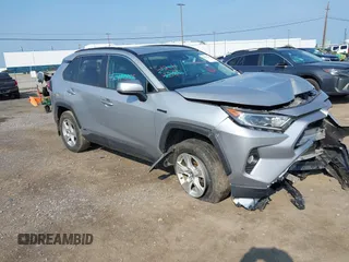 2020 Toyota RAV4 Hybrid XLE with VIN 2T3RWRFVXLW054810, listed as a IAAI auction lot 42411211 with 94,523 mi miles and . Bid and sale history available at DreamBid. Image 1.