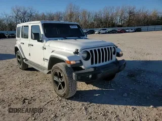 2019 Jeep Wrangler Unlimited Sahara with VIN 1C4HJXEGXKW651960, listed as a Copart auction lot 84255444 with 61,982 mi miles and Salvage title. Bid and sale history available at DreamBid. Image 11.