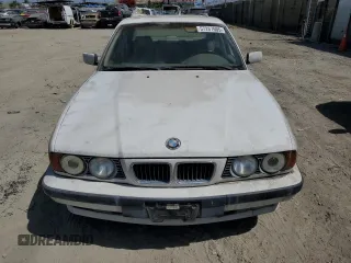 1995 BMW 5 Series 525i z VIN WBAHD6324SGK57242, wystawiony jako Copart lot #57287605 z przebiegiem Nie podano mil oraz Czysty tytuł • Clean title. Historia ofert i sprzedaży dostępna na DreamBid. Obrazek 5.