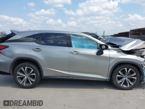 2019 Lexus RX 350L Premium with VIN JTJGZKCA5K2012847, listed as a IAAI auction lot 42331497 with 100,945 mi miles and . Bid and sale history available at DreamBid. Image 14.