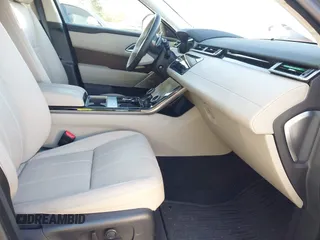 2020 Land Rover Range Rover Velar S z VIN SALYB2EXXLA295307, wystawiony jako IAAI lot #41971330 z przebiegiem 12 192 mil mil oraz . Historia ofert i sprzedaży dostępna na DreamBid. Obrazek 5.