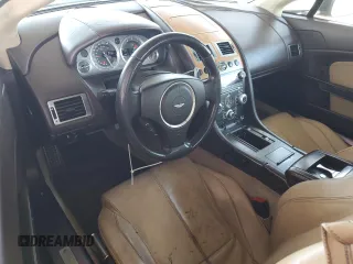 2009 Aston Martin Vantage z VIN SCFBF04CX9GD11858, wystawiony jako Copart lot #53907885 z przebiegiem 87 495 mil mil oraz Szkody całkowita. Historia ofert i sprzedaży dostępna na DreamBid. Obrazek 8.