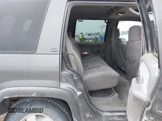 1999 GMC Yukon with VIN 1GKEK13R0XJ803237, listed as a IAAI auction lot 41736117 with 295,793 mi miles. Bid and sale history available at carsss.com. Image 8.