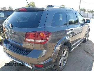 2017 Dodge Journey Crossroad Plus z VIN 3C4PDDGG3HT560915, wystawiony jako IAAI lot #42483896 z przebiegiem 130 588 mil mil oraz . Historia ofert i sprzedaży dostępna na DreamBid. Obrazek 4.