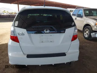 2012 Honda Fit Sport with VIN JHMGE8H55CC000608, listed as a IAAI auction lot 42025275 with 111,621 mi miles. Bid and sale history available at carsss.com. Image 16.