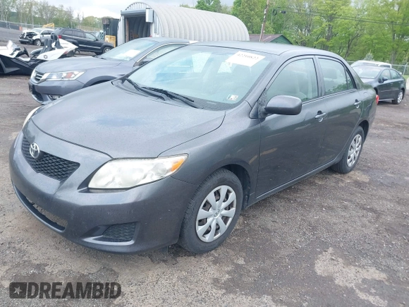 2009 Toyota Corolla with VIN JTDBL40E999048446, listed as a IAAI auction lot 42210822 with 260,005 mi miles. Bid and sale history available at carsss.com. Image 2.