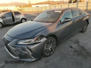2022 Lexus ES 300h z VIN 58ADA1C12NU025768, wystawiony jako Copart lot #79717704 z przebiegiem 70 690 mil mil oraz Szkoda całkowita • Salvage title. Historia ofert i sprzedaży dostępna na DreamBid. Obrazek 1.