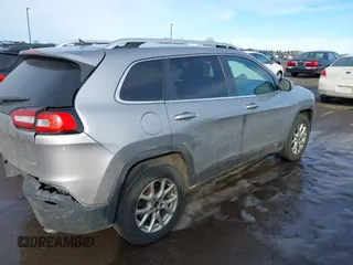 2014 Jeep Cherokee Latitude with VIN 1C4PJMCS9EW122196, listed as a IAAI auction lot 41649757 with 205,363 mi miles and . Bid and sale history available at DreamBid. Image 4.