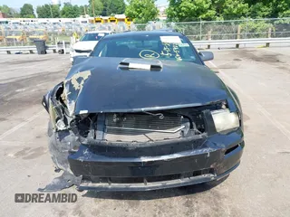 2008 Ford Mustang Deluxe z VIN 1ZVHT80N985155422, wystawiony jako IAAI lot #42312812 z przebiegiem Nie podano mil oraz . Historia ofert i sprzedaży dostępna na DreamBid. Obrazek 13.