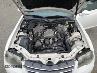 2005 Chrysler Crossfire Limited z VIN 1C3AN65L35X038546, wystawiony jako Copart lot #67074124 z przebiegiem 103 019 mil mil oraz Szkoda całkowita • Salvage title. Historia ofert i sprzedaży dostępna na DreamBid. Obrazek 11.
