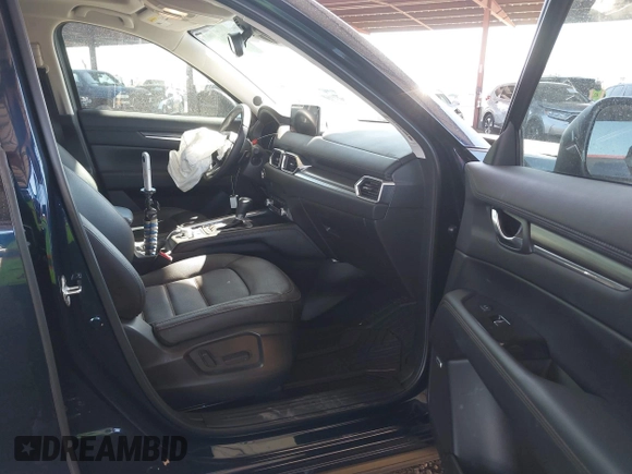 2023 Mazda CX-5 2.5 S Premium Plus Package with VIN JM3KFBEM3P0125736, listed as a IAAI auction lot 41578619 with 18,560 mi miles. Bid and sale history available at carsss.com. Image 5.