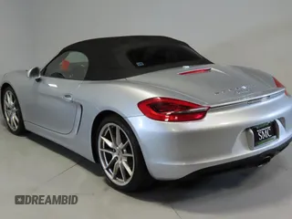 2014 Porsche Boxster with VIN WP0CA2A83ES120705, listed as a Copart auction lot 63518515 with 65,603 mi miles and Salvage title. Bid and sale history available at DreamBid. Image 4.