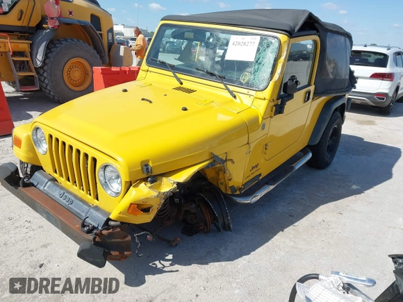 2004 Jeep Wrangler Sport with VIN 1J4FA49S64P759360, listed as a IAAI auction lot 42028277 with 176,880 mi miles and . Bid and sale history available at DreamBid. Image 2.