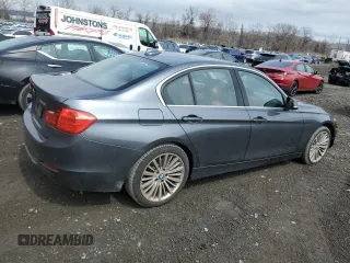2015 BMW 3 Series 328i xDrive with VIN WBA3B5G53FNS12387, listed as a Copart auction lot 51802455 with 93,173 mi miles and Salvage Title. Bid and sale history available at carsss.com. Image 3.