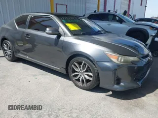 2015 Scion tC with VIN JTKJF5C7XF3088807, listed as a IAAI auction lot 41958463 with 87,647 mi miles. Bid and sale history available at carsss.com. Image 1.