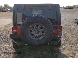 2013 Jeep Wrangler Unlimited Rubicon 10th Anniversary z VIN 1C4HJWFG2DL572943, wystawiony jako Copart lot #80610363 z przebiegiem 88 296 mil mil oraz Szkoda całkowita • Salvage title. Historia ofert i sprzedaży dostępna na DreamBid. Obrazek 6.