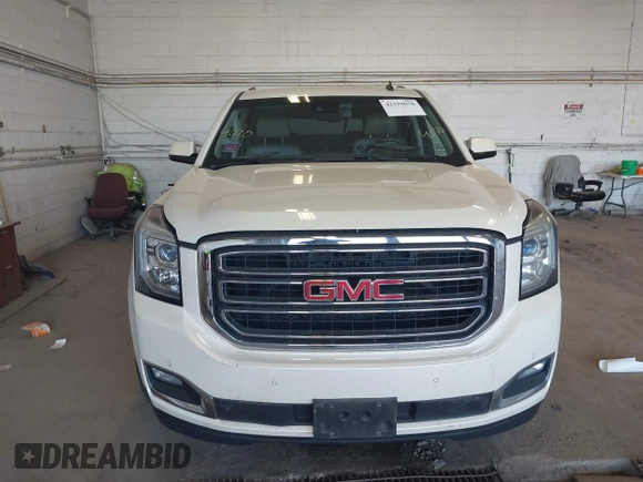 2015 GMC Yukon SLT z VIN 1GKS2BKC8FR109563, wystawiony jako IAAI lot #42194070 z przebiegiem 203 619 mil mil oraz . Historia ofert i sprzedaży dostępna na DreamBid. Obrazek 12.