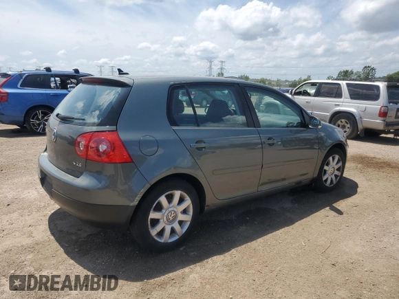 2007 Volkswagen Rabbit с VIN WVWCR91K67W102577, выставлен на аукционе Copart как лот 61670645 с пробегом 179 985 миль миль и Списание • Salvage title. История ставок и продаж доступна на DreamBid. Изображение 3.