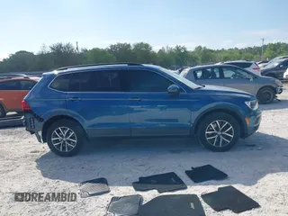 2019 Volkswagen Tiguan SE with VIN 3VV3B7AX2KM006055, listed as a IAAI auction lot 42023713 with 83,570 mi miles and . Bid and sale history available at DreamBid. Image 14.