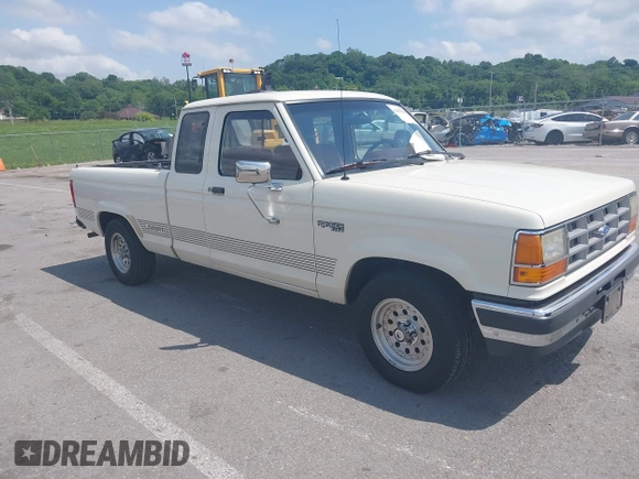 1990 Ford Ranger z VIN 1FTCR14T2LPB21654, wystawiony jako IAAI lot #42270150 z przebiegiem 92 465 mil mil oraz . Historia ofert i sprzedaży dostępna na DreamBid. Obrazek 1.