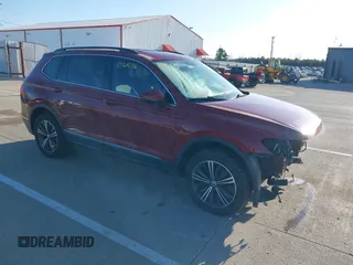 2018 Volkswagen Tiguan SEL z VIN 3VV2B7AX6JM039344, wystawiony jako IAAI lot #41934536 z przebiegiem 93 838 mil mil oraz . Historia ofert i sprzedaży dostępna na DreamBid. Obrazek 1.