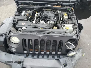 2017 Jeep Wrangler Sport z VIN 1C4AJWAG4HL563093, wystawiony jako Copart lot #51603125 z przebiegiem 105 618 mil mil oraz Szkoda całkowita • Salvage title. Historia ofert i sprzedaży dostępna na DreamBid. Obrazek 12.