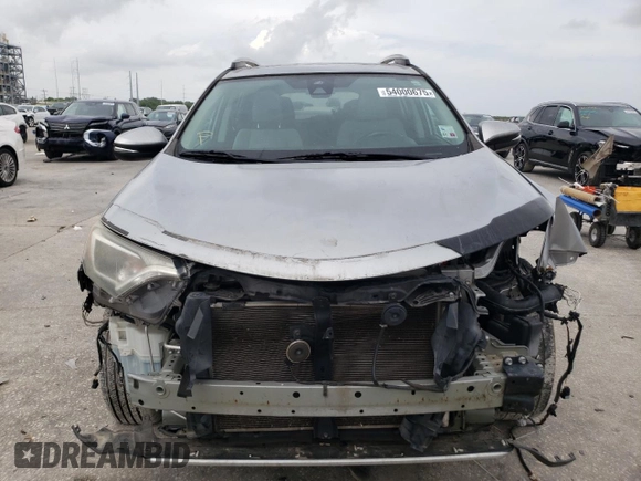 2018 Toyota RAV4 XLE with VIN 2T3WFREV2JW446388, listed as a Copart auction lot 54000675 with Not Provided miles and Salvage Title. Bid and sale history available at DreamBid. Image 5.