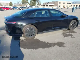 2025 Lucid Air Pure with VIN 50EA1PGA7SA004788, listed as a IAAI auction lot 41518561 with 1,872 mi miles. Bid and sale history available at carsss.com. Image 4.