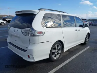 2014 Toyota Sienna SE with VIN 5TDXK3DC1ES422510, listed as a IAAI auction lot 41030376 with Not Provided miles and . Bid and sale history available at DreamBid. Image 4.