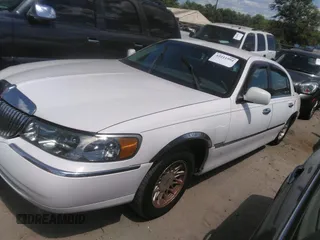 1998 Lincoln Town Car Signature with VIN 1LNFM82W4WY672955, listed as a IAAI auction lot 42211994 with 162,058 mi miles and . Bid and sale history available at DreamBid. Image 2.