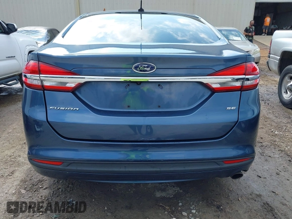 2018 Ford Fusion SE z VIN 3FA6P0H79JR195109, wystawiony jako IAAI lot #41664930 z przebiegiem 105 374 mil mil oraz . Historia ofert i sprzedaży dostępna na DreamBid. Obrazek 17.