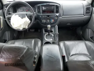 2006 Mazda Tribute i with VIN 4F2YZ02Z26KM14821, listed as a Copart auction lot 71718434 with 318,841 mi miles and Salvage Title. Bid and sale history available at carsss.com. Image 8.